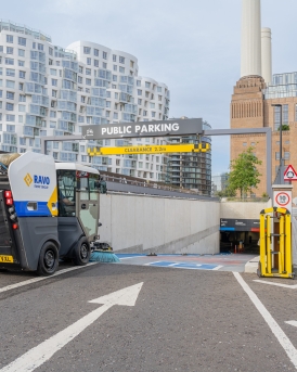 RAVO R1 sweeping a parking garage.