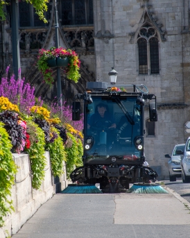 E2 sweeping the pavement over a bridge.