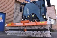 R2 fitted with snow brush attachment